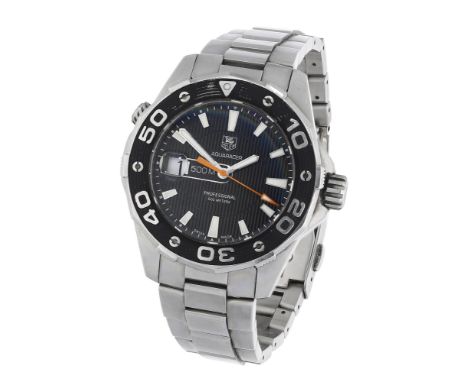 Tag Heuer. A stainless steel diver’s watch with date, Aquaracer, 500m, circa 2010. Movement: quartz. Dial: black, ribbed desi