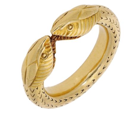 A 19th century gold serpent ring, the double headed serpent realistically modelled and with scale pattern engraving throughou