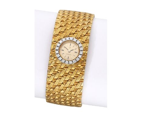 Omega. A lady’s gold and diamond-set bracelet watch, circa 1963. Movement: cal. 640, manual winding, 17 jewels, no. 20813539.