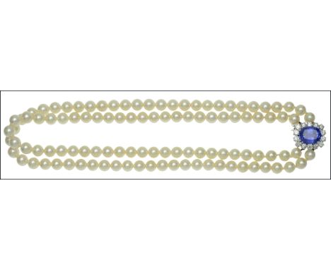 A cultured pearl necklace with tanzanite and diamond cluster clasp, the two rows of cultured pearls, measuring approximately 