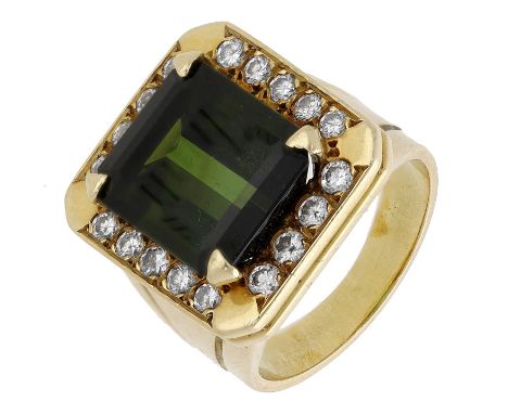 A tourmaline and diamond set dress ring, the rectangular bezel centred with a step-cut green tourmaline within a surround of 