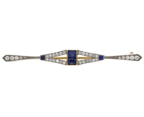 An early 20th century sapphire and diamond bar brooch, of tapering form and set with step and trapezoid-cut sapphires and sin