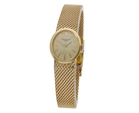 Patek Philippe. A lady’s gold oval bracelet watch, Ref. 4109/1, circa 1978. Movement: manual winding, 20 jewels, stamped with