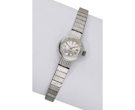 Omega. A lady’s white gold bracelet watch, circa 1961. Movement: cal. 580, manual winding, 17 jewels, no. 18423877. Dial: sil