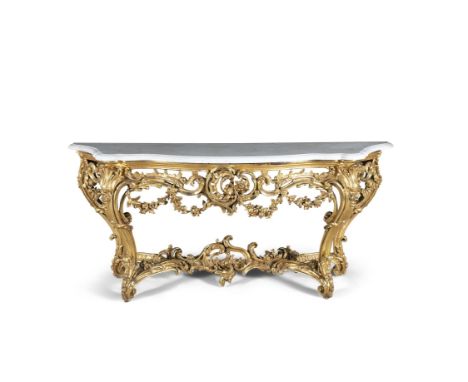 A CONTINENTAL GILTWOOD SERPENTINE CONSOLE TABLE, 19TH CENTURYfitted with Carrara marble top and supported in carved scrollwor