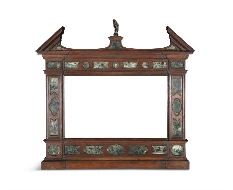 A CONTINENTAL MAHOGANY AND MARBLE INSET ARCHITECTURAL FRAME,with broken pediment, surmounted by a bronze figural statue. 66 x
