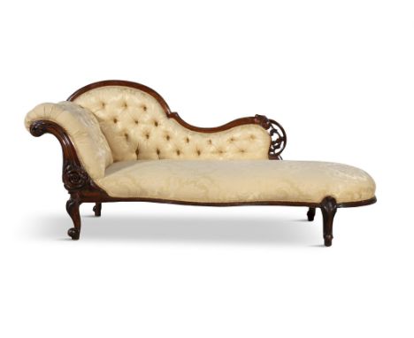 A VICTORIAN MAHOGANY BUTTON BACK UPHOLSTERED CHAISE LONGUE, with raised arched back and single scroll-end covered in a yellow