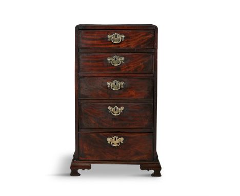 A SMALL 19TH CENTURY MAHOGANY COMPACT CHEST OF DRAWERS with five graduated drawers with brass handles and escutcheons on brac