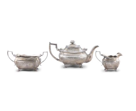 A REGENCY SILVER THREE PIECE TEA SERVICE,Dublin c.1814 (sugar bowl); 1815 (milk jug); 1820 (teapot), each with wavy rim, the 