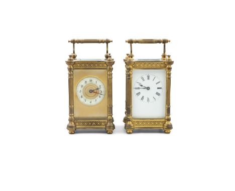 TWO EDWARDIAN BRASS CASED CARRIAGE CLOCKSeach of rectangular form with raised handles. Each 15cm high (including handle) Cond