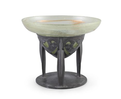 AN ARTS & CRAFTS TUDRIC PEWTER CENTREPIECE, PROBABLY BY ARCHIBALD KNOX FOR LIBERTY & CO,with fitted clutha glass bowl, the pe