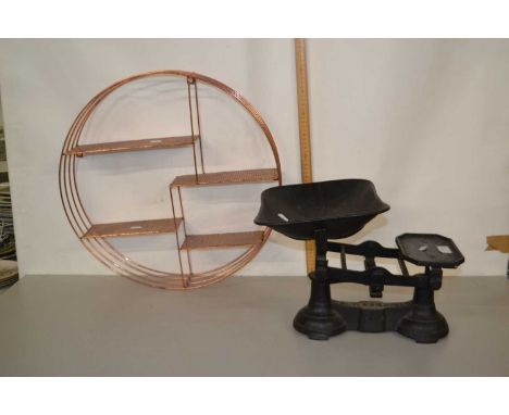 Vintage kitchen scales and a metal wall mounted shelf unit