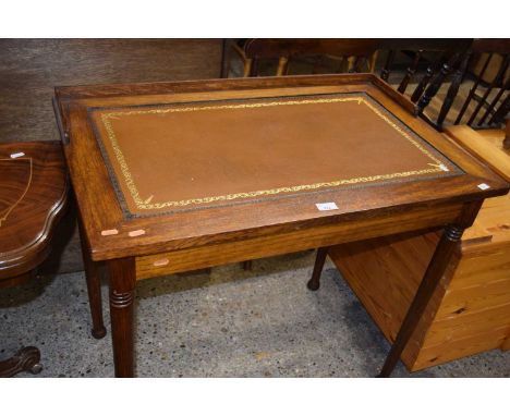 An Edwardian oak writing table with leather inset, 87cm wide (Item 130 on vendor list)