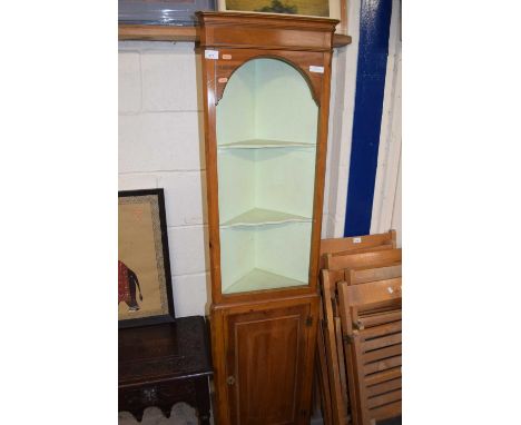 A small corner cabinet with cupboard base (Item 111 on vendor list)