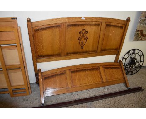 An oak double bed frame (Item 114 on vendor list)