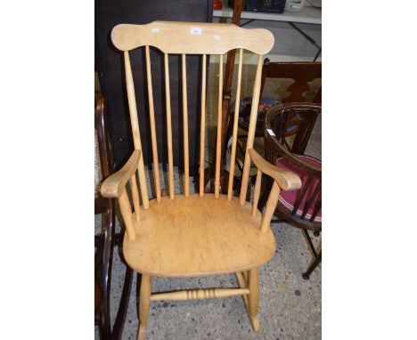 A mid Century Ercol style stick back rocking chair