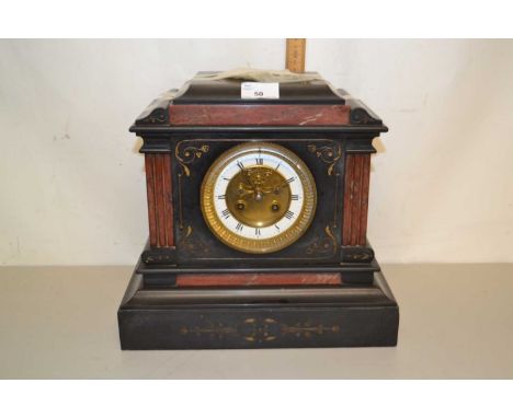 A Victorian black slate and marble cased mantel clock