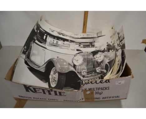 A group of large format black and white photographs of various vintage motor cars