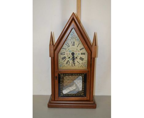 A mantel clock by The New England Clock Company