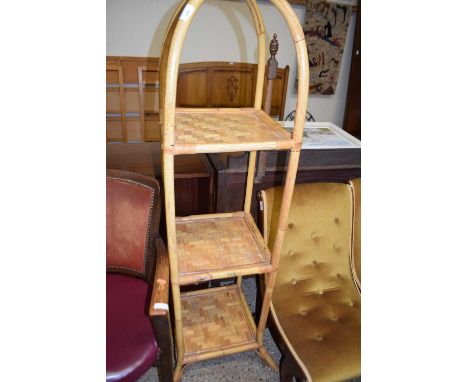 A bamboo three tier what-not, 150cm high (Item 86 on vendor list)