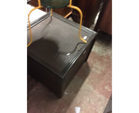 A WOODEN TRUNK