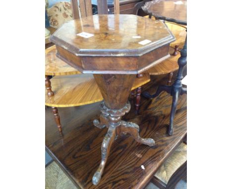 A Victorian burr walnut sewing table. H70cm.