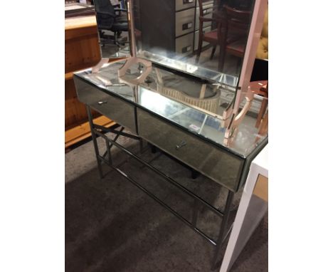 A MIRRORED CONSOLE TABLE ON CHROME BASE