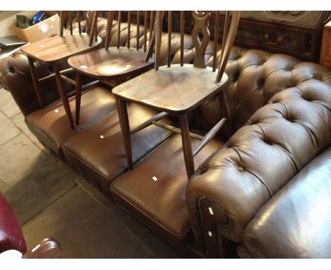 A Chesterfield brown button leather settee.