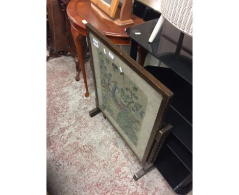 A TAPESTRY FIRE SCREEN 