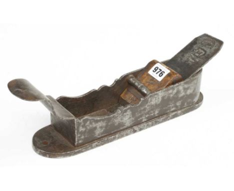 A 17/18c German iron mitre plane 11" x 3" with decoratively shaped sides and scrolled tote (illustrated Russell fig 795) Prov