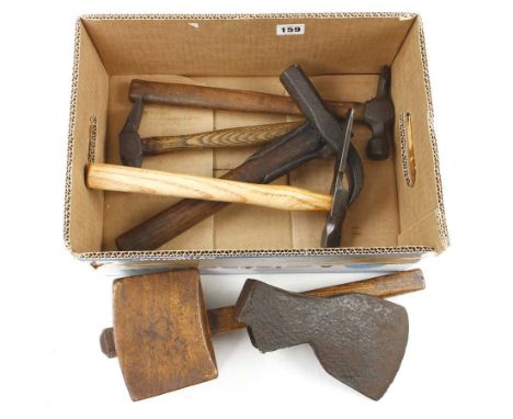 Four hammers, a mallet and an axe head G+