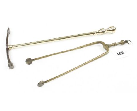 A pair of brass ember tongs (for lighting a pipe) and an unusual brass handled hammer G+