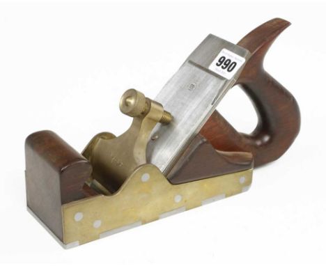 A recent 2 1/2" brass smoother with d/t steel sole and cocobola infill and handle constructed from parts by the Shepherd Tool