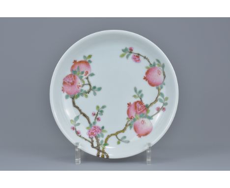 A Chinese famille rose porcelain dish finely painted with eight pomegranates. Six character seal mark of Qianlong possibly of