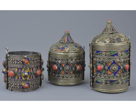 Two Middle Eastern White Metal Jars and Covers together with a similar Bangle (3)