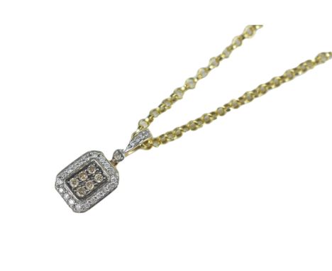 A 14k gold square pendant with diamonds on a gold colour metal chain untested together with a yellow metal pendant with stone