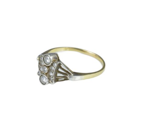 A vintage diamond cluster ring with two larger round cut diamonds. Metal untested with no markings. Ring size S