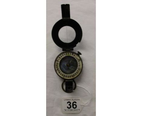 MKIII WWII fluid filled pocket compass (black, military issue) - inscribed T.G. Co Ltd London No.B94064, 1940
