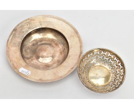 TWO SILVER DISHES, the first of a circular form, hallmarked London 1973, approximate diameter 17cm, together with a circular 