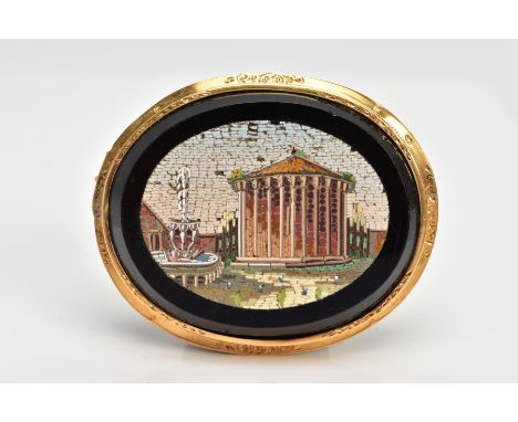 A VICTORIAN MICRO MOSAIC BROOCH, of an oval form, depicting the temple of Hercules by a fountain, within a yellow metal colle