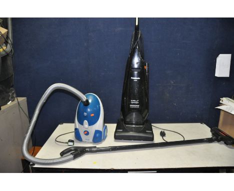 A PANASONIC UPRIGHT VACUUM CLEANER  a Powa Caddy Classic golf trolley ( no battery so untested)and a Power Devil Vacuum clean