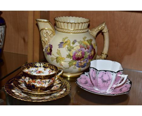 A ROYAL WORCESTER BLUSH IVORY JUG, shape no. 1382, decorated with pansies and raised gilt detail, reg no. 125935, date cypher