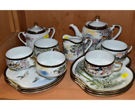 A JAPANESE GEISHA PART TEASET BY HAYASI, comprising five tea cups, six palette shaped saucers, teapot, milk jug and covered s