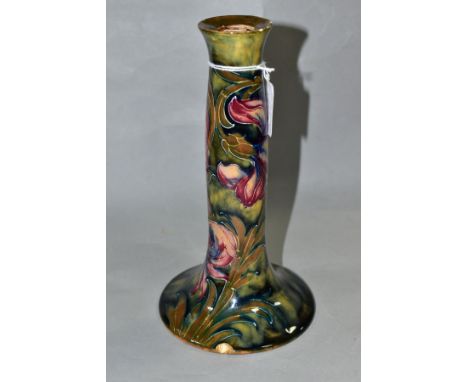 A WILLIAM MOORCROFT SPANISH PATTERN CANDLESTICK, of ogee inverted trumpet form, mottled green/blue ground underglaze green si