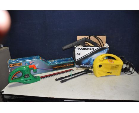 A KARCHER K2 PRESSURE WASHER  (PAT pass and working) with a challenge cordless hedge trimmer (untested due to no battery or c