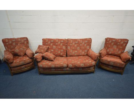 AN ERCOL RENAISSANCE THREE PIECE LOUNGE SUITE, comprising a sofa, length 195cm, and a pair of armchairs, width 92cm