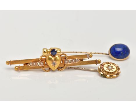 A YELLOW METAL BAR BROOCH AND TWO STICK PINS, the brooch fitted with a heart, set with a rose cut diamond, split pearls and a