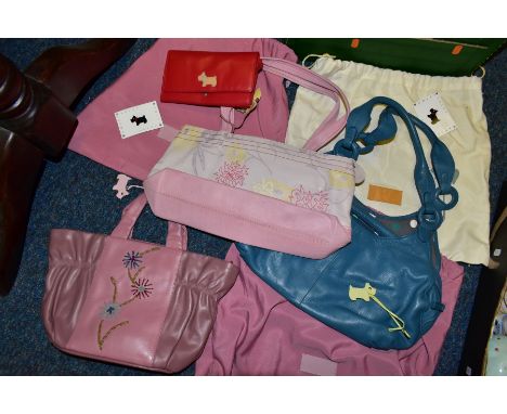 THREE RADLEY HANDBAGS AND A RADLEY PURSE, the purse in red leather, used condition, width 19cm, the handbags comprising a pin