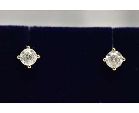 A PAIR OF 9CT GOLD DIAMOND STUD EARRINGS, each fitted with a four-claw setting, round brilliant cut diamond, total estimated 