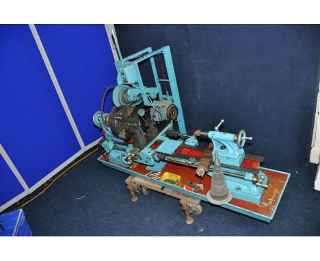 A VINTAGE ATLAS METAL WORKING LATHE with a 3ft long bed, a Pratt Burnerd D7544 10in chuck with 4 independent jaws, a full set